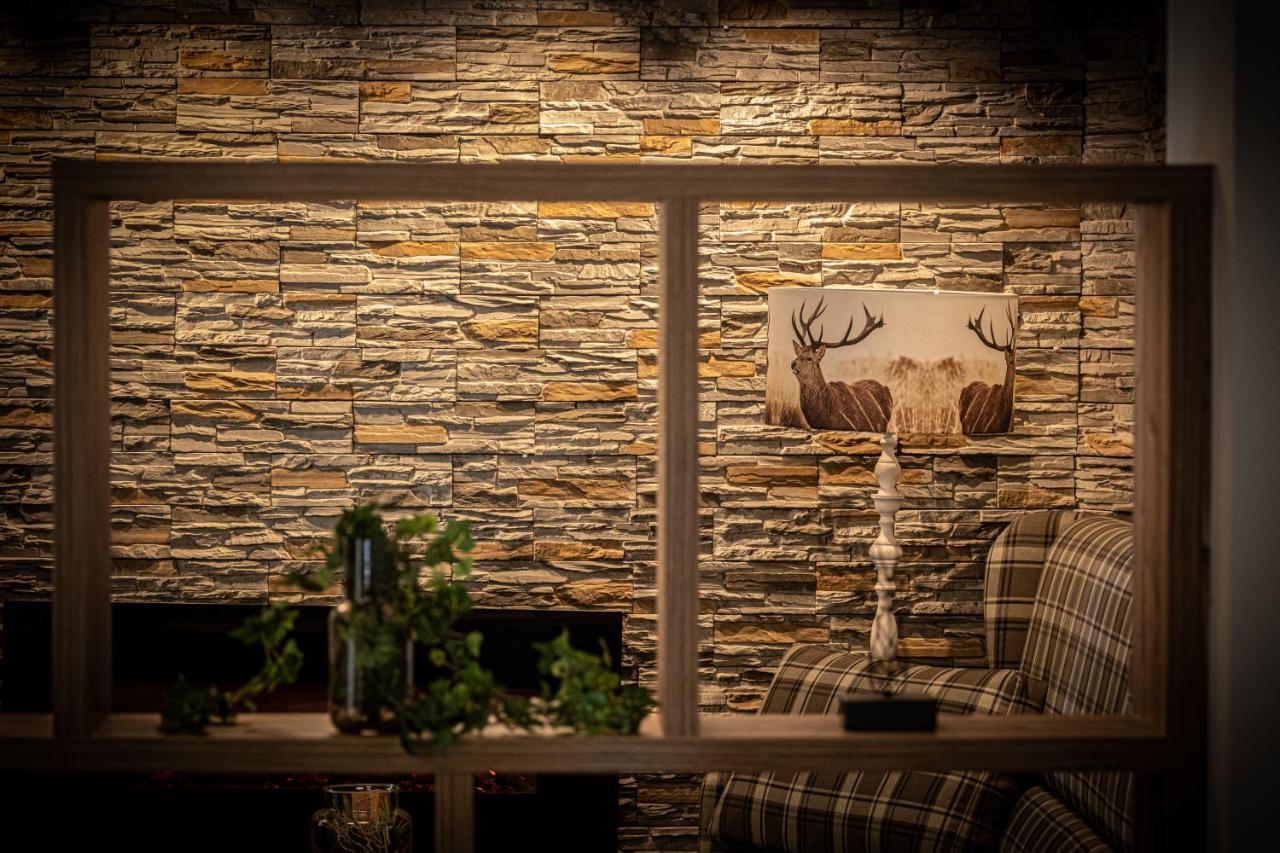 Home-Hotel Salzberg Berchtesgaden Exterior foto A stone wall
